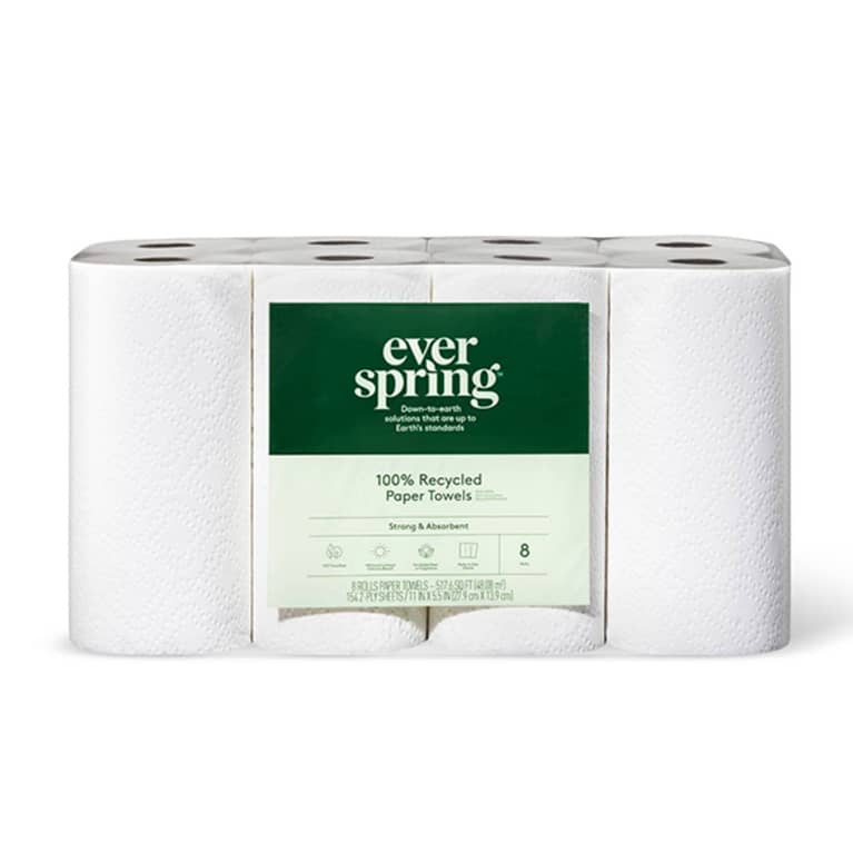 collection of white paper towel rolls with green label