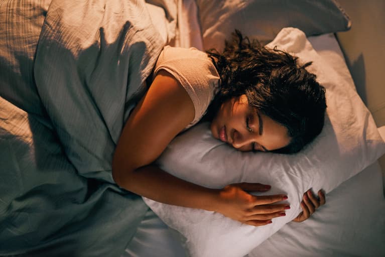 Woman Asleep In Bed