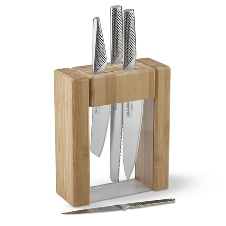 three knives in clear wood block