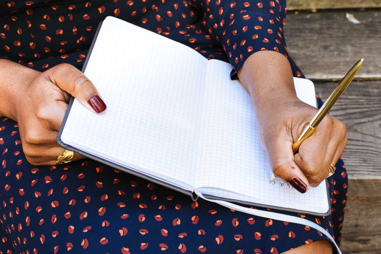 Woman Journaling Outdoors
