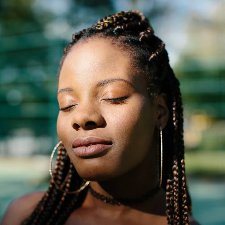 Portrait Of An African-American Woman With Eyes Closed