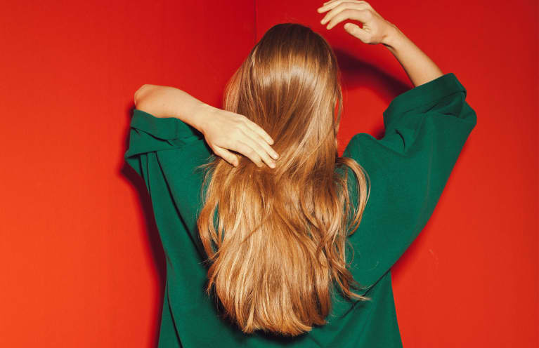 Lusting After Long Locks? Try These 10 Oils for Healthy Hair Growth