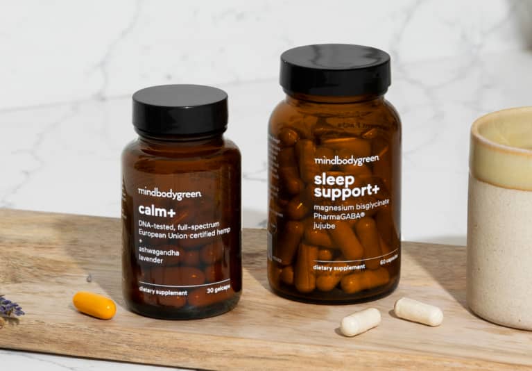 two supplement bottles side-by-side, in soothing bathroom