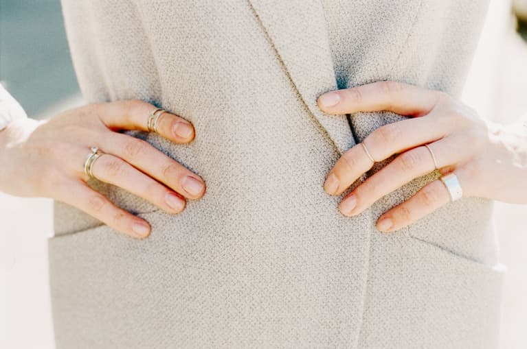 Woman with Hands on Hips in Winter Coat