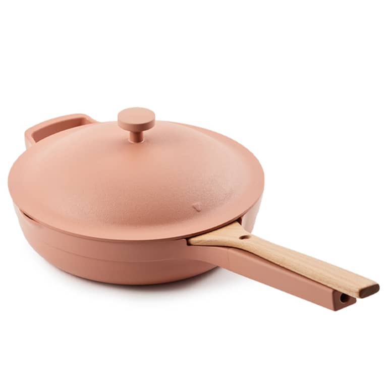 terracotta color pan with lid and build-in spoon holder