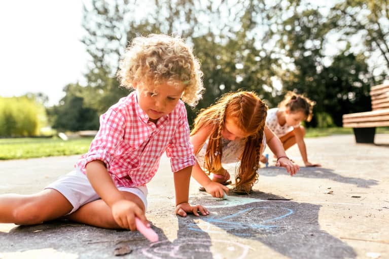 Kids Playing Outside and Drawing with Sidewalk Chalk