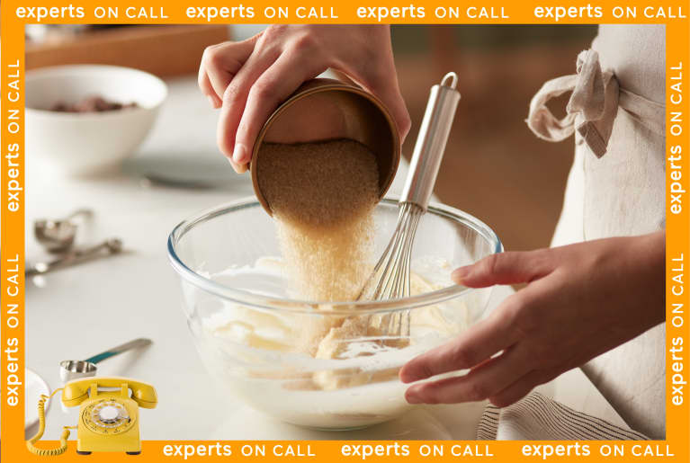 Brown sugar being poured into dough