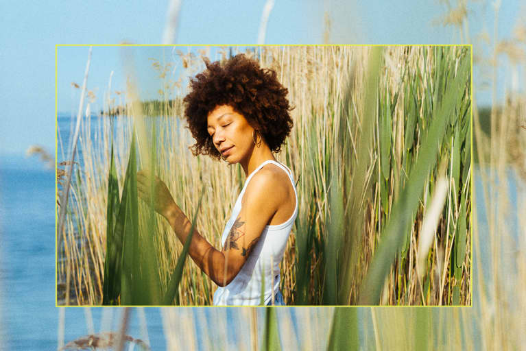 Cool afro woman enjoying a summer day in nature