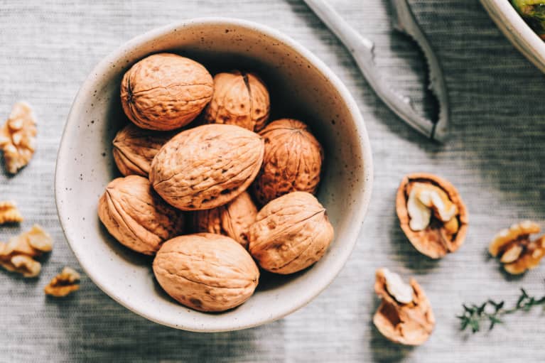 Bowl of Walnuts and a Nut Cracker