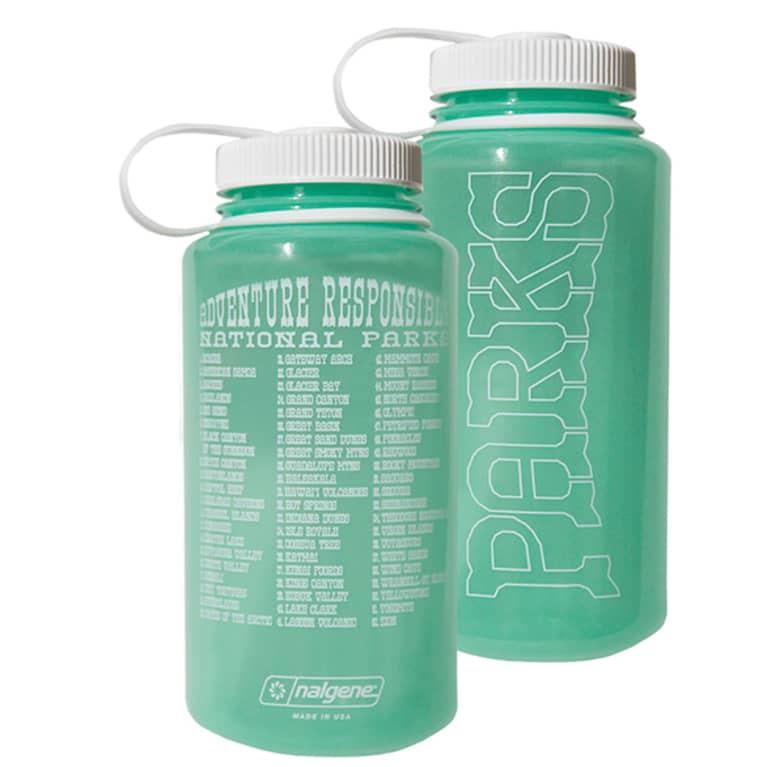 plastic water bottle in light green with white writing and lid plastic water bottle in light green with white writing and lid