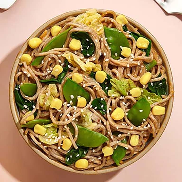 bowl of noodles with greens