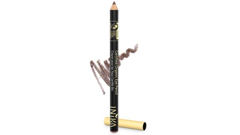 INIKA Certified Organic Eye Pencil with gold top, black pencil, and brown smudge