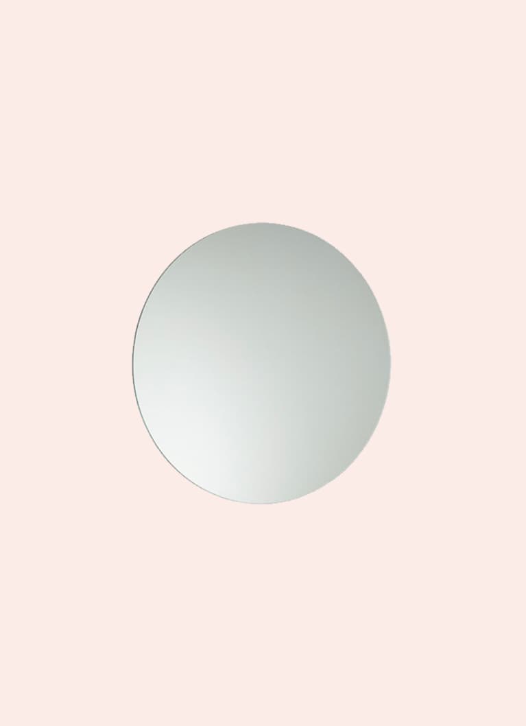 circular mirror on pink background circular mirror on pink background