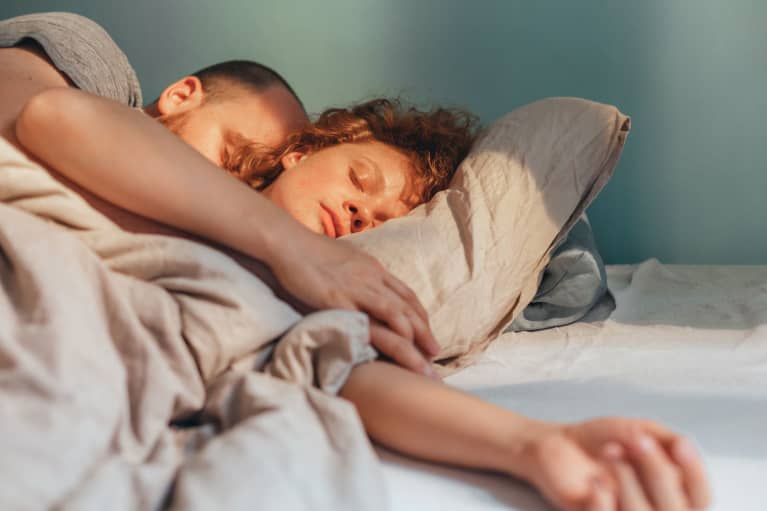 couple sleeping in bed