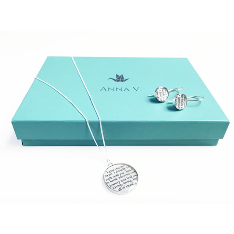 paper necklace over light blue box