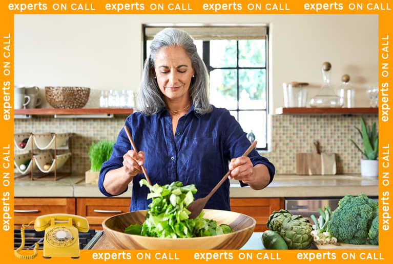 Older woman making a salad