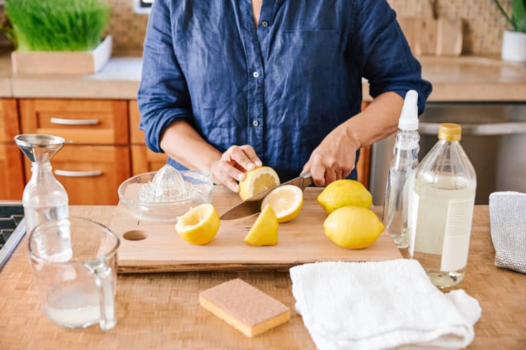 Woman Making Her Own Natural Cleaning Products At Home